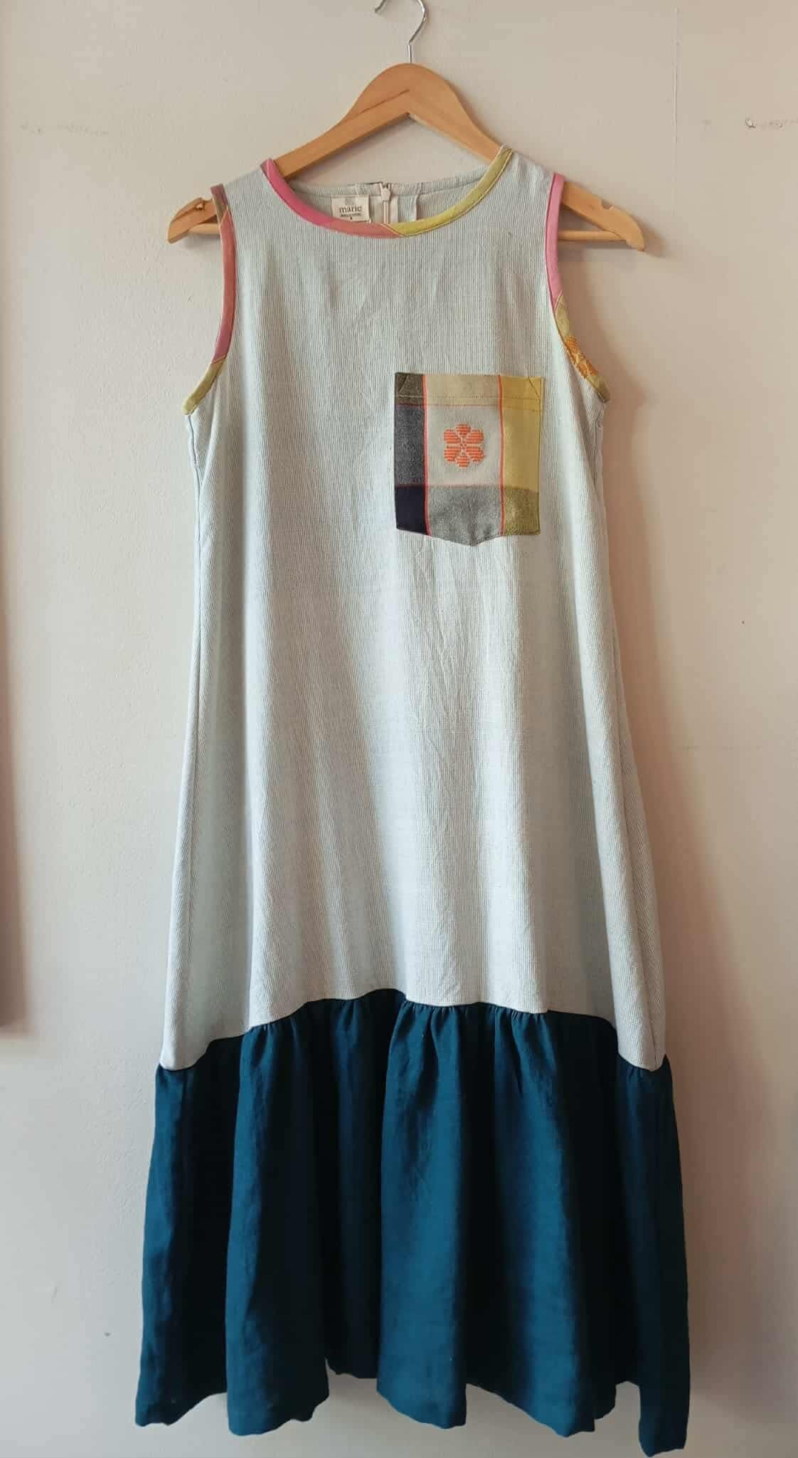 BESTIDA COLLECTION: DUSTY BLUE SLEEVELESS W/ AMELIA POCKET W/ DARK TEAL  LINEN SKIRT