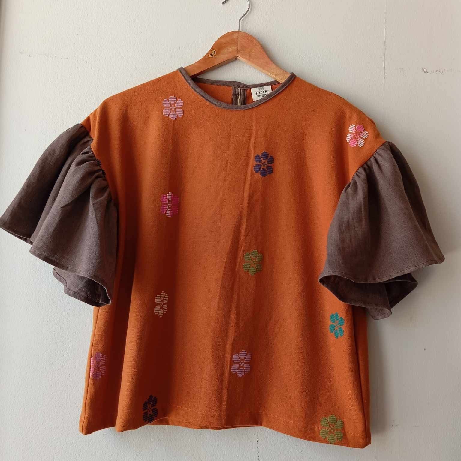 CORAZON: GLAZED GINGER FLOWERS W/ COCOA LINEN SLEEVES